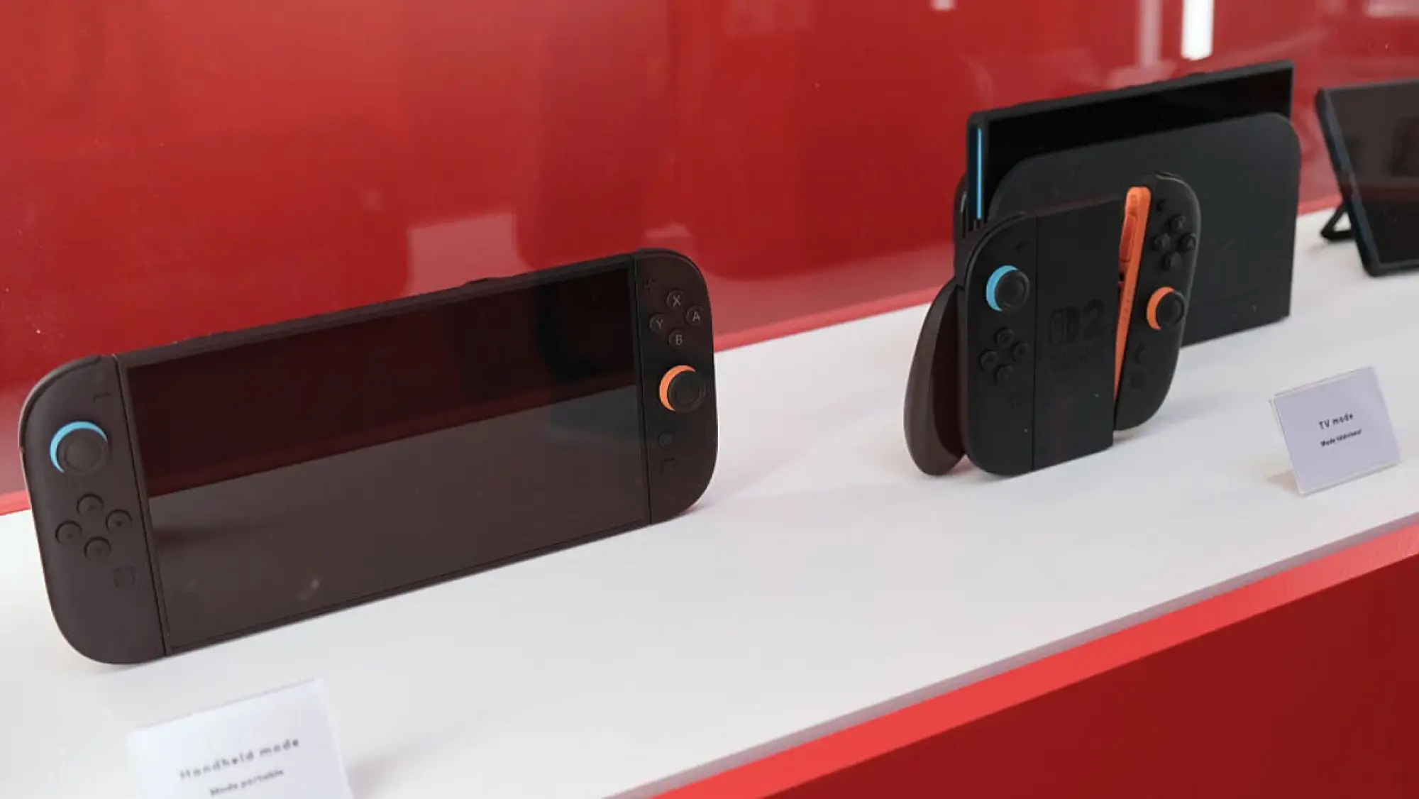 nintendo switch 2 consoles behind glass display
