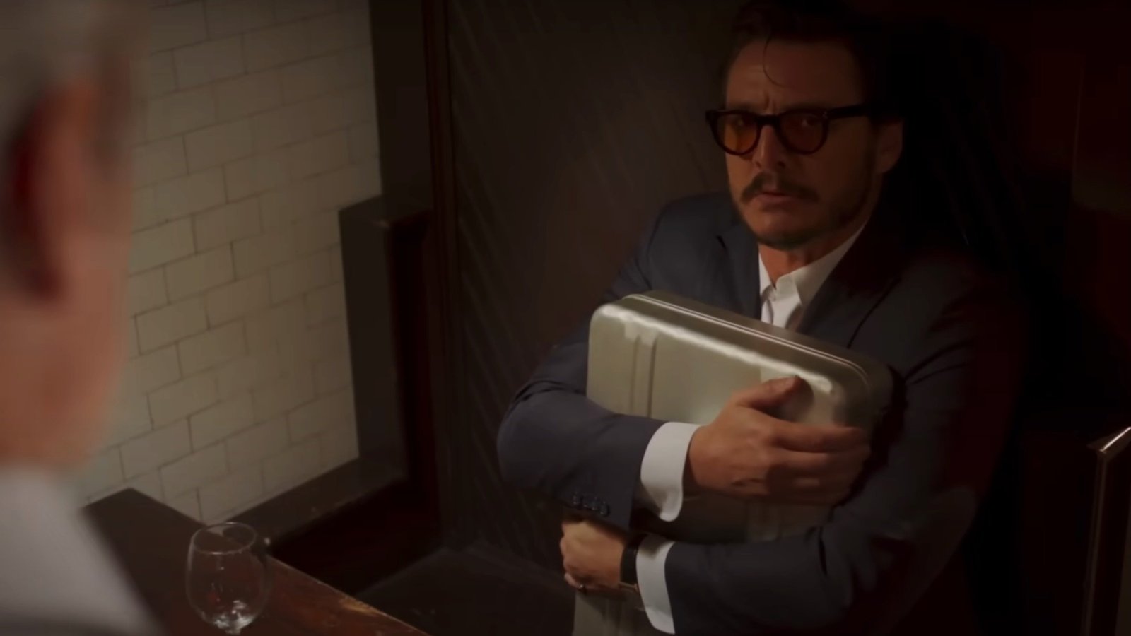 Pedro Pascal as Santos in "Drive-Away Dolls."