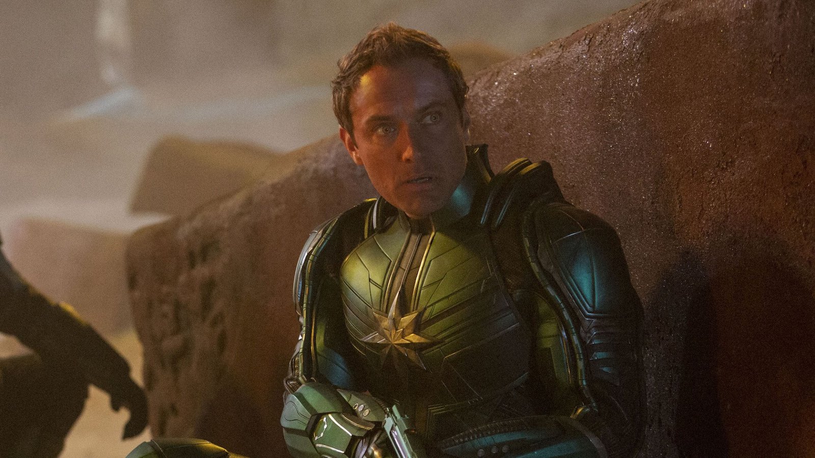images-319-fill_-size_2000x1125-v1631560209 A man in a green metal alien suit with his head exposed: Jude Law as Yon-Rogg in "Captain Marvel."